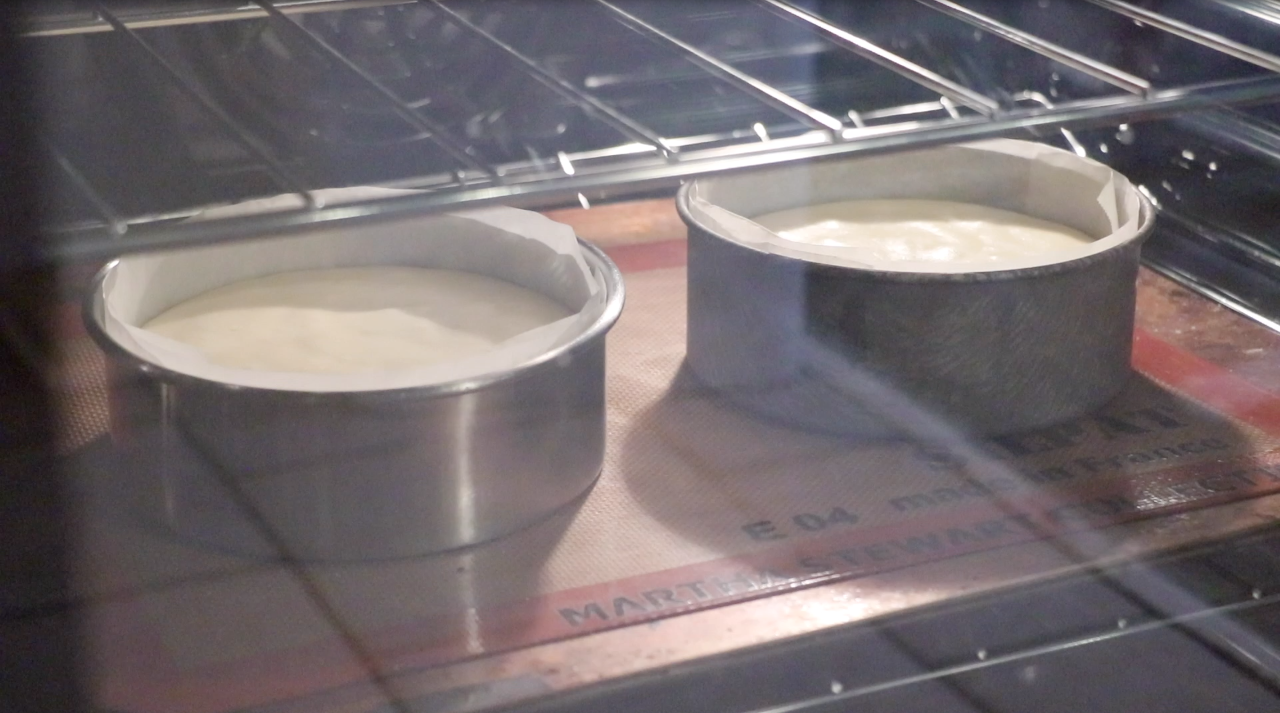 2 genoise sponge cake in the oven before rising