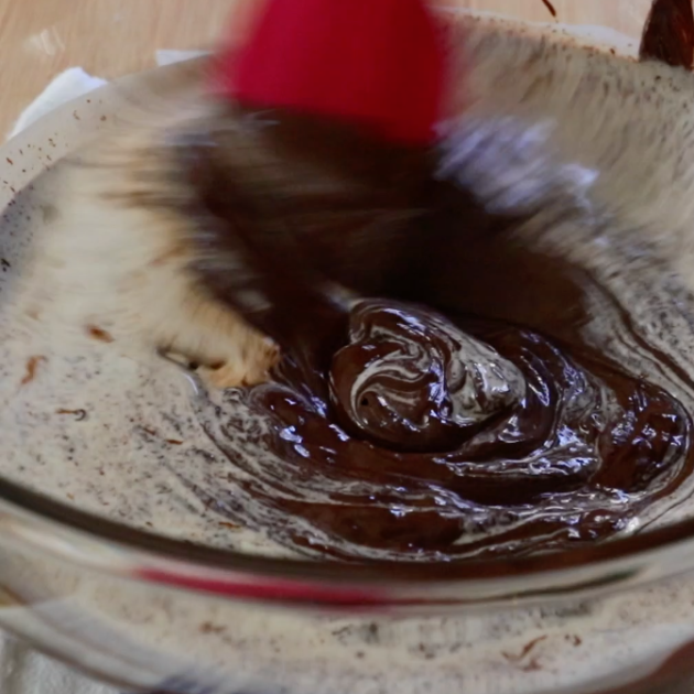 mixing heavy cream and chocolate to make ganache