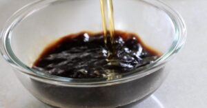 adding cognac in coffee syrup