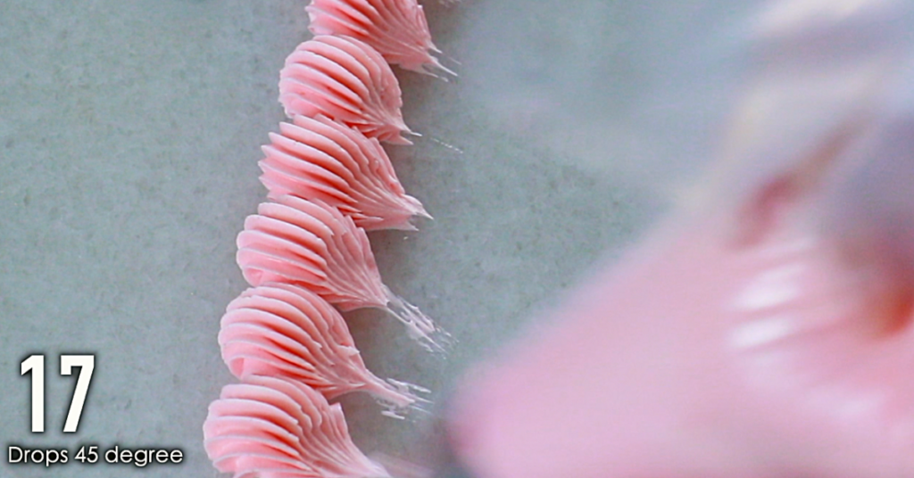 pink buttercream decorations, drop shapes