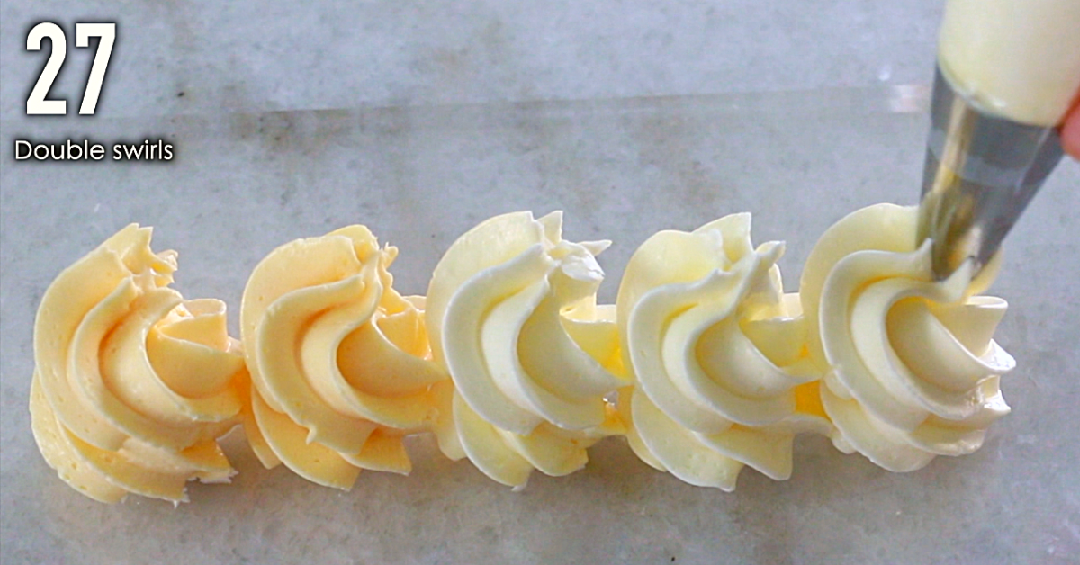 white and orange buttercream decorating: how to pipe double swirls