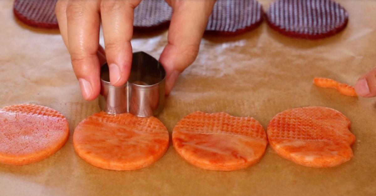 shaping pumpkin cookie dough