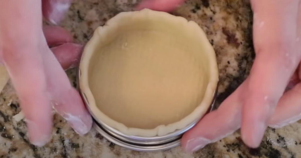 setting up tart dough in a tartlet ring
