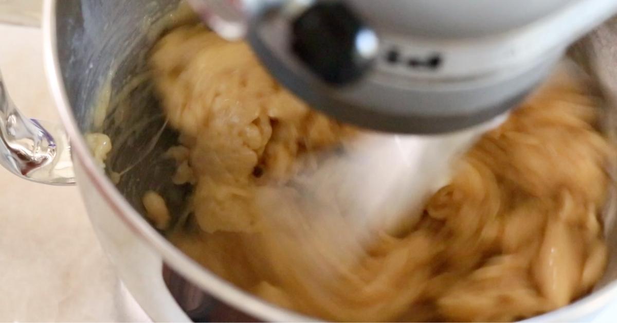 mixing egg in choux pastry dough