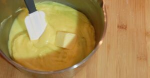adding butter in pastry cream