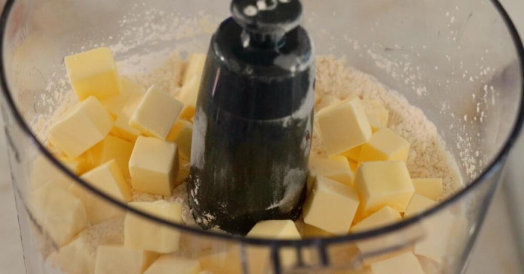 butter, flour, sugar and salt in a food processor