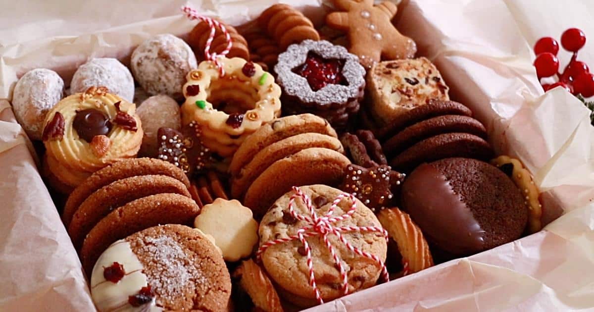 christmas cookie box filled with multiple kinds of cookies