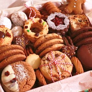 10 kids of holiday cookies in a box