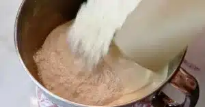 adding cake flour in whipped eggs