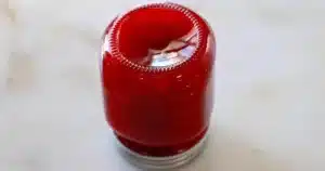 strawberry jam in a jar flipped