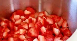 cubed strawberries in a pot