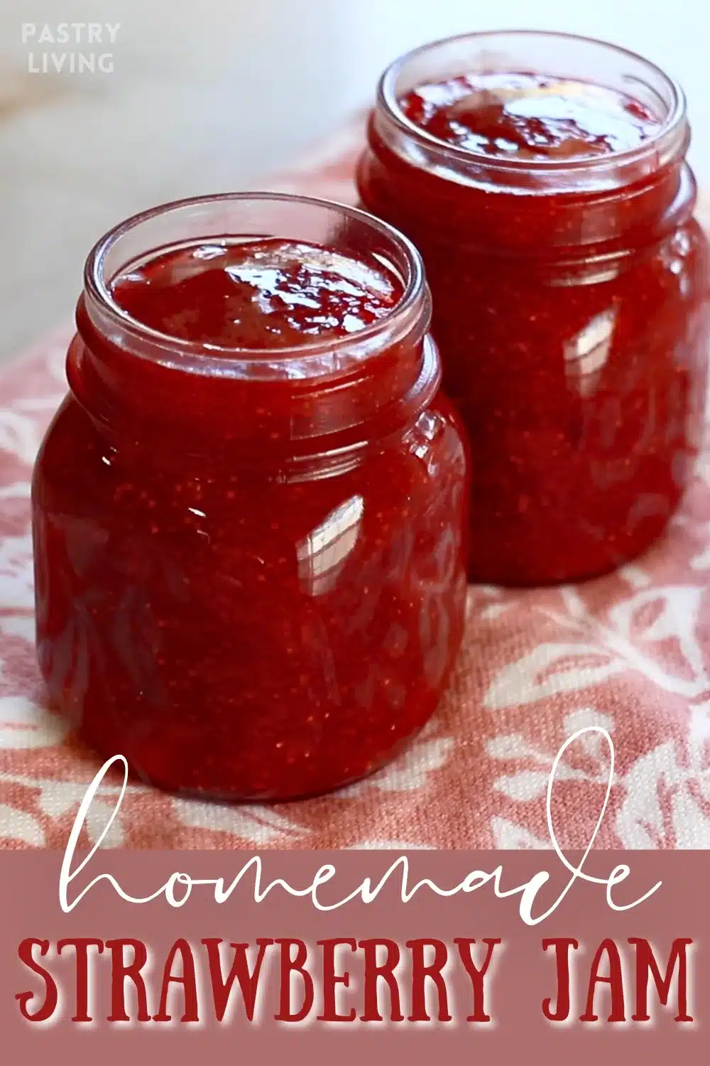 homemade strawberry jam in 2 glass jars