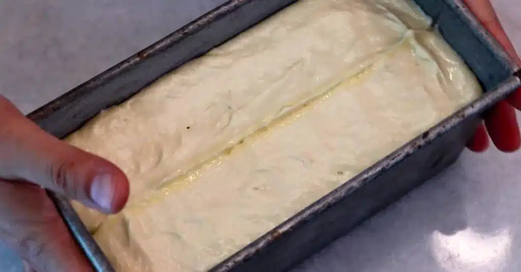inserted melted butter with a dough scraper to bake lemon pound cake