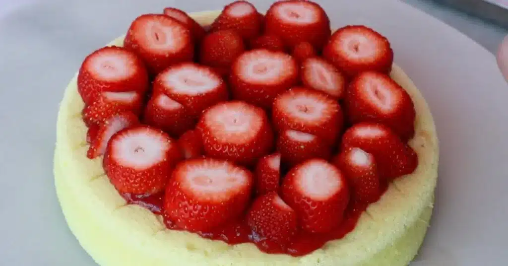 fresh strawberries on strawberry jam to make strawberry cream cake