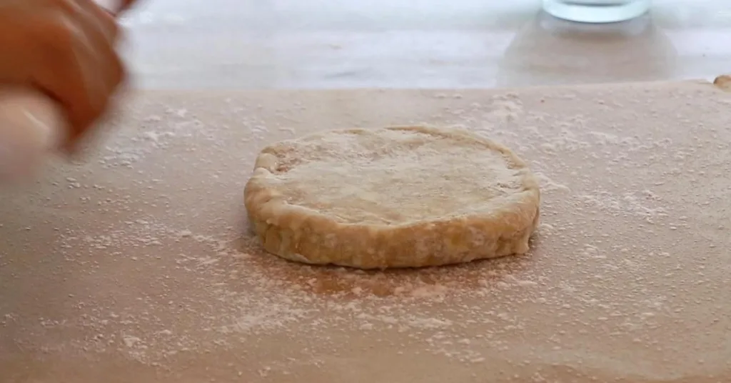 pie dough on parchment paper