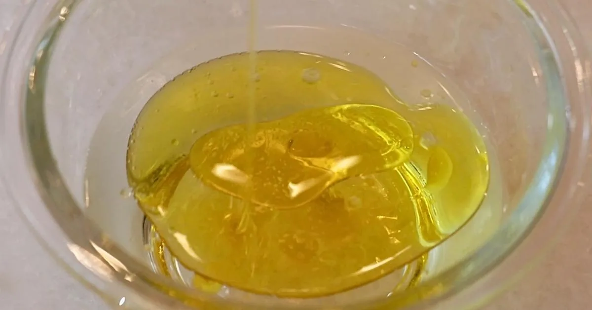 adding oil in water to make pie dough