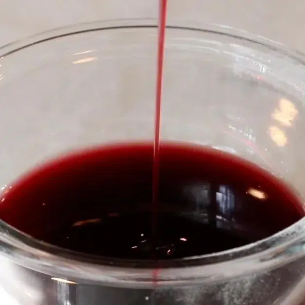 cherry syrups in a bowl