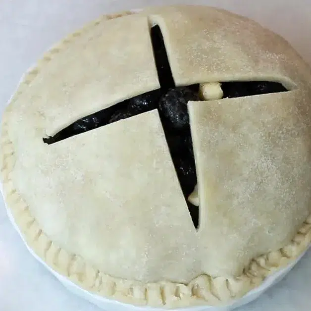 assembled small blueberry pie