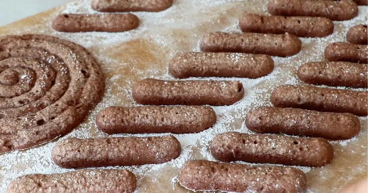chocolate ladyfingers cooling down on a table