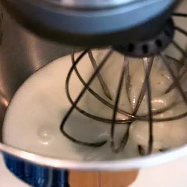 heated sugar and egg white in a mixing bowl