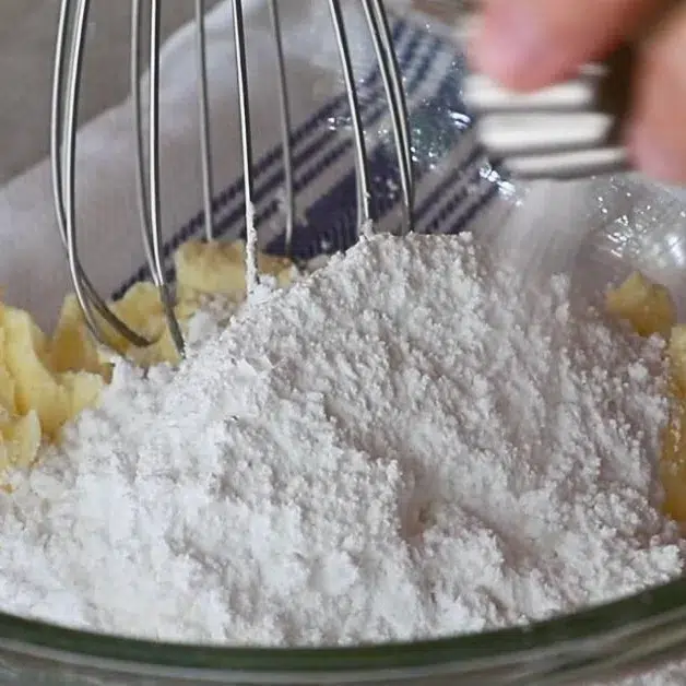 butter, powdered sugar, and salt in a bowl