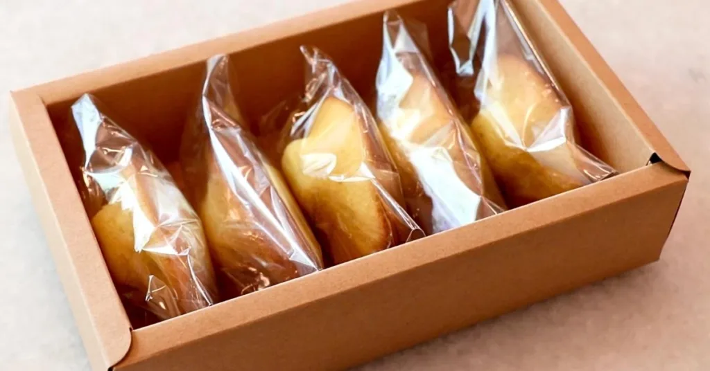 homemade madeleines wrapped in a box