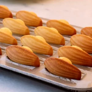 cooling all the madeleines in a pan