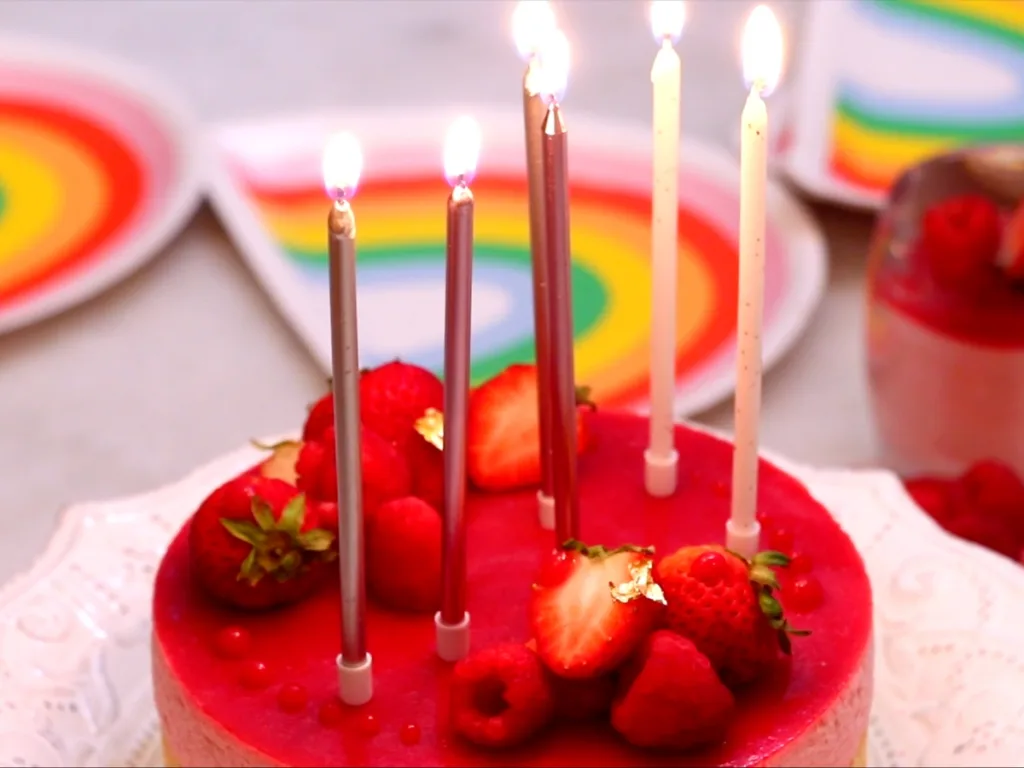 raspberry mousse cake with candles