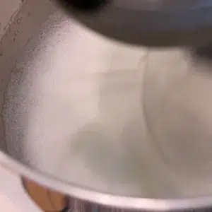 whipping egg white to make Italian meringue