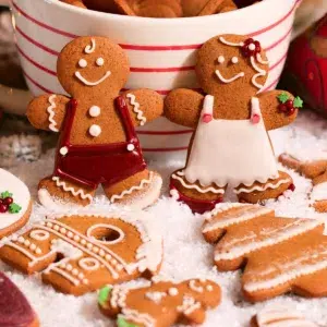 homemade gingerbread men cookies on a pile of snow
